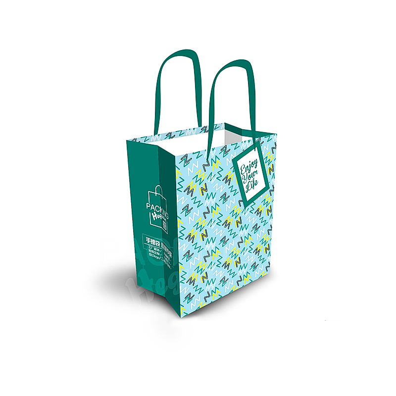 Colorful paper gift bags with handles for birthday party favors