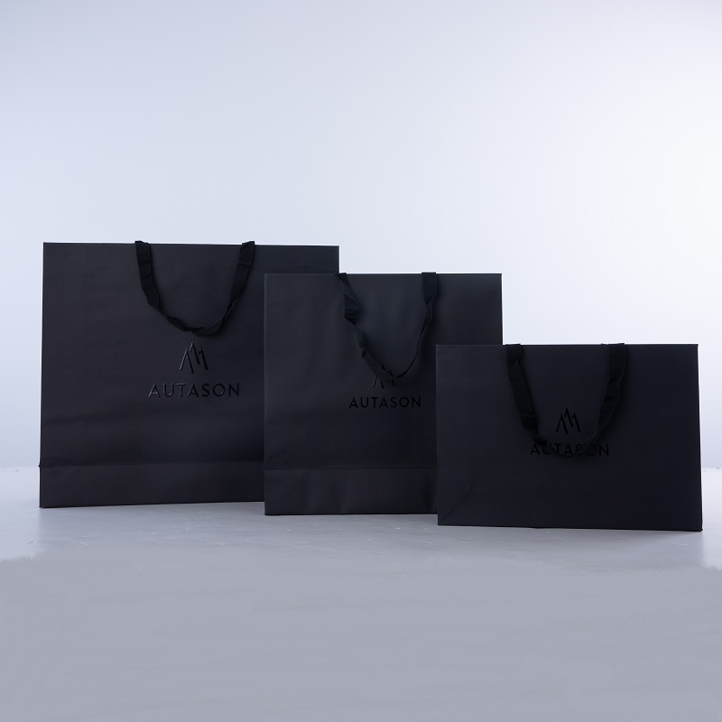 Custom retail bags Luxury Boutique Clothing Packaging Die cut Handle Premium Shopping special Paper Gift Bag